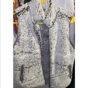 A grey fur vest